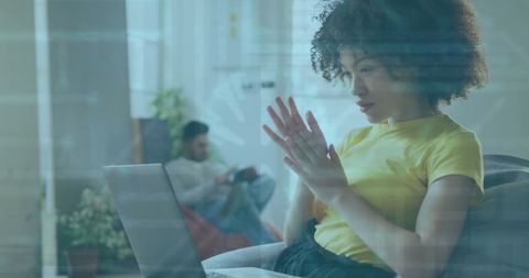 Focused African American Businesswoman Analyzing Data in Modern Office