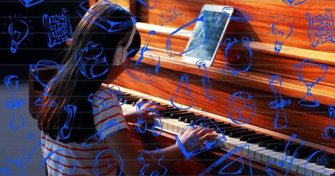 Young Girl Practicing Piano with Tablet and Headphones
