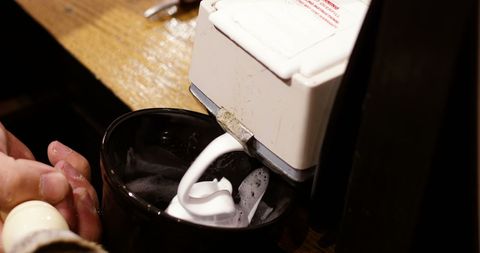 barbershop foam dispenser filling bowl with shaving cream - Download Free Stock Images Pikwizard.com