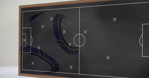 Soccer Game Strategy on Chalkboard with Ball Overlay