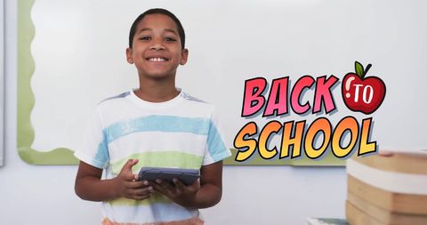 Excited Student Using Tablet Technology in Classroom