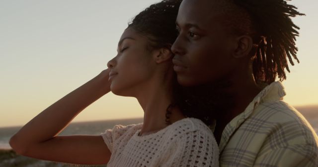 Romantic Couple Embracing at Sunset by the Beach - Download Free Stock Images Pikwizard.com