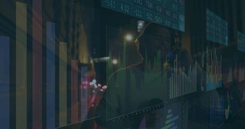 Trader analyzing data with futuristic transparent display