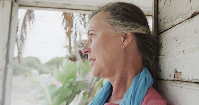 Senior woman relaxing in rustic outdoor setting - Download Free Stock Images Pikwizard.com