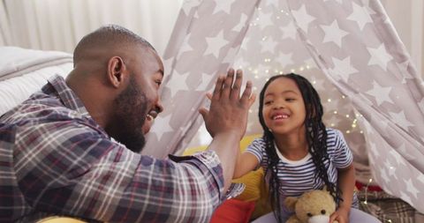Father Daughter Bonding in Cozy Blanket Tent Atmosphere