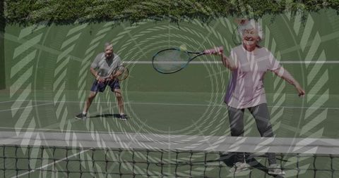 Active Seniors Enjoying Outdoor Tennis Game