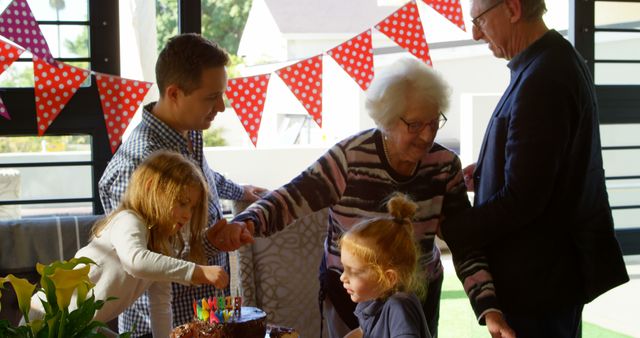 Multi-Generational Family Celebrating Birthday at Home - Download Free Stock Images Pikwizard.com