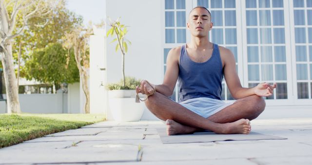 Man Practicing Yoga Meditation Outdoors on Sunny Day - Download Free Stock Images Pikwizard.com