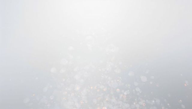 Soft Silver Bokeh with Warm Gold Sparks for Elegant Background and Luxury Light Texture