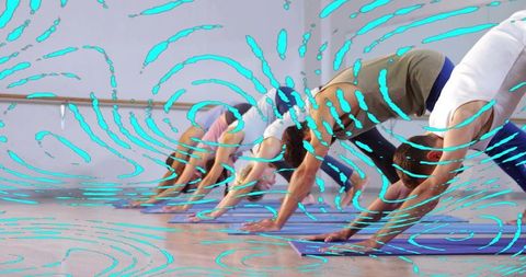 Six adults practicing downward dog in yoga class with turquoise overlay and ballet barre