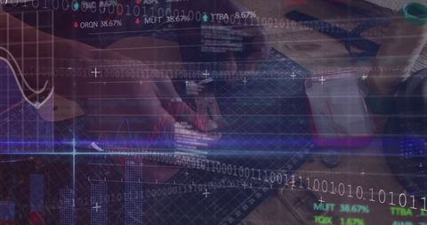 Engineer soldering circuit board with digital data overlay