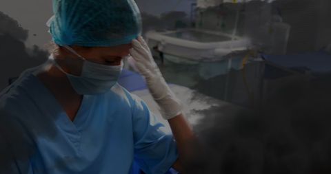 Nurse in scrubs and mask battling with workplace stress