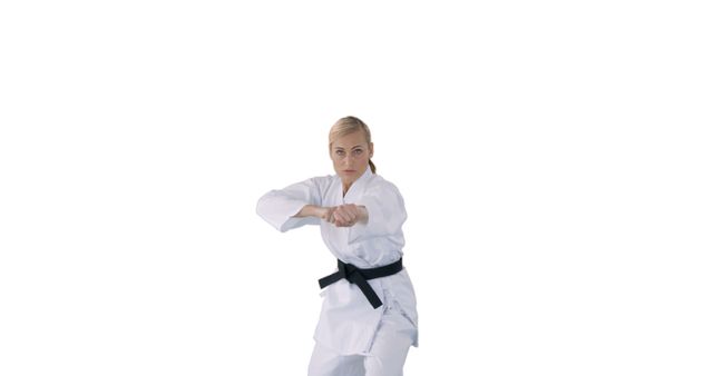 Young Blonde Woman Practicing Karate in White Gi with Black Belt - Download Free Stock Images Pikwizard.com