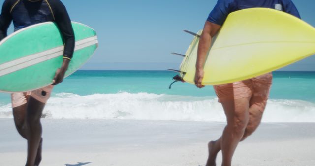 Surfers Holding Surfboards Walking on Beach - Download Free Stock Images Pikwizard.com