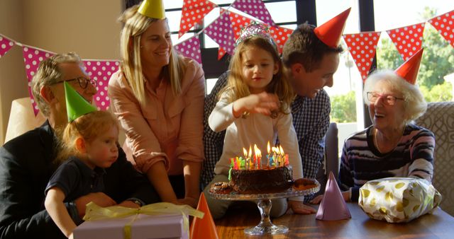 Family celebrating little girl birthday at home - Download Free Stock Photos Pikwizard.com