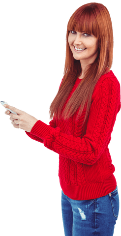 smiling woman with red hair wearing sweater holding smartphone transparently - Download Free Stock Videos Pikwizard.com