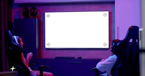Two women playing console games wearing headsets in neon-lit modern gaming room screen