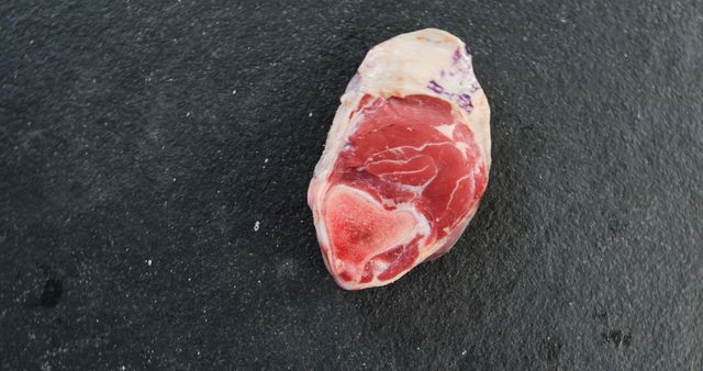 Raw Lamb Chop on Dark Slate Background - Download Free Stock Images Pikwizard.com