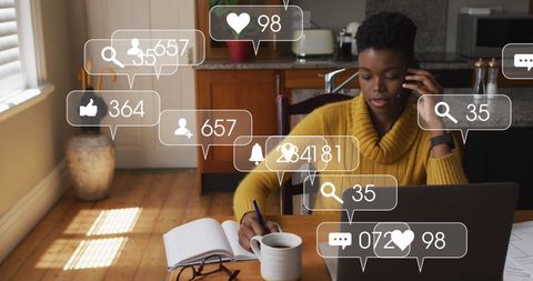 Woman Engaging in Social Media While Working from Home Office