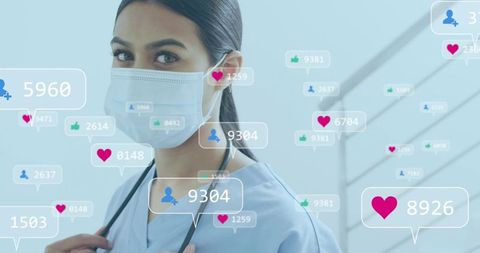 Nurse in Scrubs with Digital Social Media Icons in Hospital