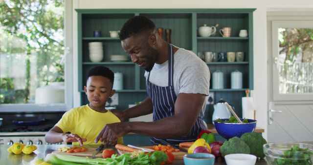 Father and Son Preparing Fresh Vegetables in Kitchen - Download Free Stock Images Pikwizard.com