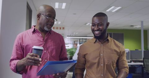 Professional Discussion Between Colleagues in Modern Office