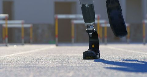 Prosthetic Assisted Walking on Sunny Track Indicating Progress
