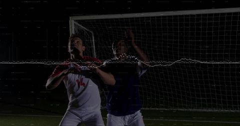 Dynamic Soccer Athletes Competing Under Night Lights with Digital Waveform