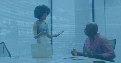 Professional discussion on financial analysis in modern office