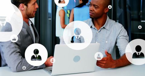 Diverse entrepreneurs collaborating in modern office setting