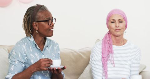 Senior friends celebrating cancer survivorship at home