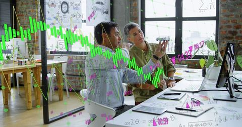 Diverse Professionals Analyzing Financial Data at Office Desk