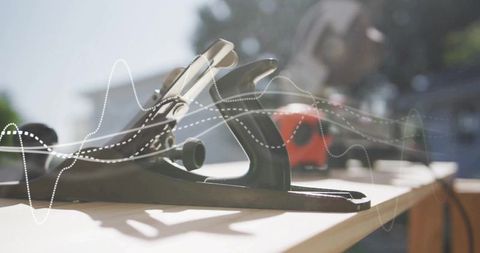 Traditional hand plane on outdoor workbench