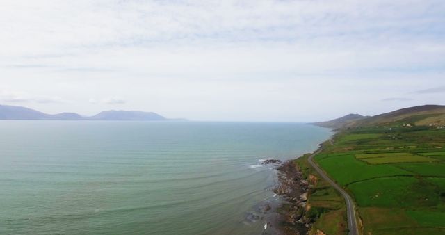 Coastal Road Along Panoramic Coastline with Rolling Hills and Mountains - Download Free Stock Images Pikwizard.com