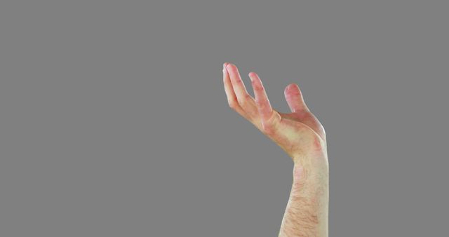 Hands Gesturing Against Grey Background in Close-Up - Download Free Stock Images Pikwizard.com