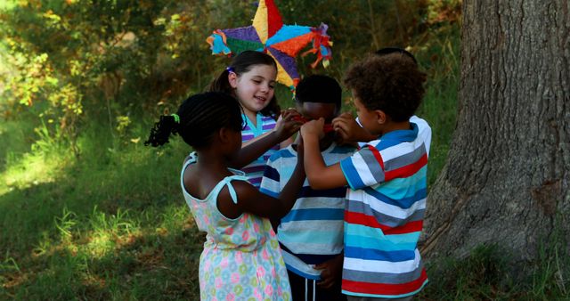 Children Playing with Piñata in Park on Sunny Day - Download Free Stock Images Pikwizard.com