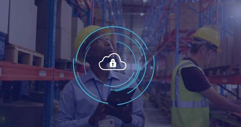 Warehouse supervisor checking inventory with tablet and cloud security overlay