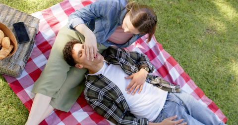 Happy Couple Relaxing During Picnic on Sunny Day - Download Free Stock Images Pikwizard.com