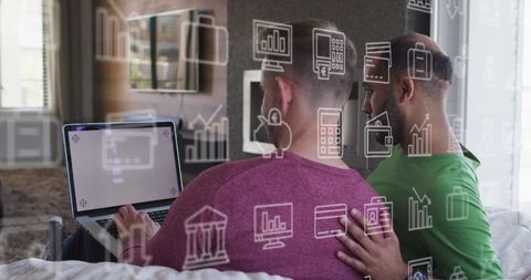 diverse couple using laptop with virtual interface icons - Download Free Stock Images Pikwizard.com