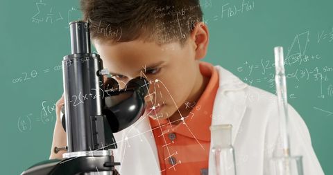 Curious Boy Exploring Science with Microscope and Mathematics - Download Free Stock Images Pikwizard.com