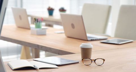 Modern Workspace with Laptops and Coffee Cup - Download Free Stock Images Pikwizard.com