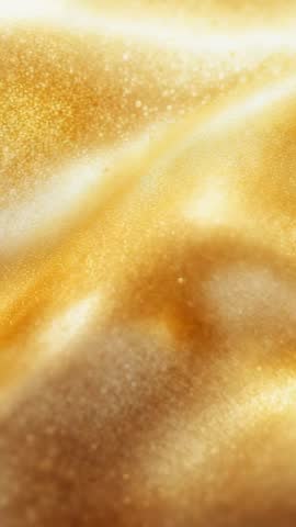 Shimmering Gold Surface Shifting Under Warm Macro Light Revealing Pearly Highlights