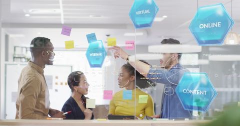 Diverse Team Collaborating on Digital Strategy with Virtual Interface - Download Free Stock Images Pikwizard.com