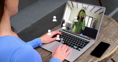 Woman Video Calling on Laptop at Café, Social Networking Concept