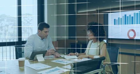 Team collaboration on business data in modern conference room