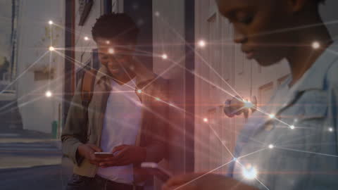 African American Friends Using Smartphones with Digital Network