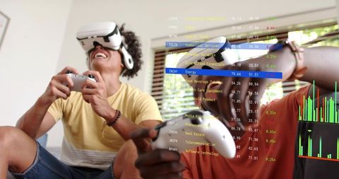 Playing virtual reality games with finance HUD overlay on living room sofa with friends