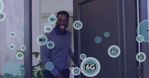Smiling professional entering workspace with 6g technology icons