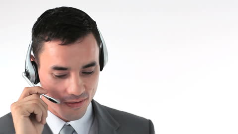 Businessman Using Headset for Communication