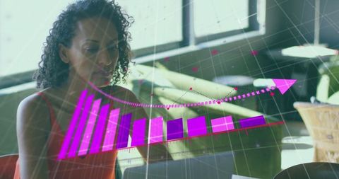 Focused Businesswoman Analyzing Digital Growth Trend in Modern Workspace